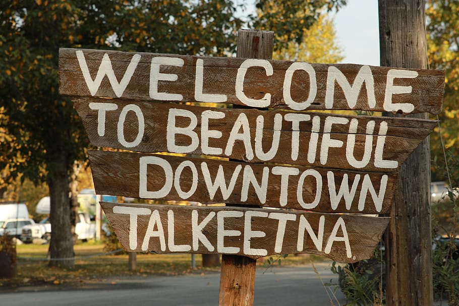 sign, welcome, talkeetna, downtown, pride, text, communication, western script, information, information sign