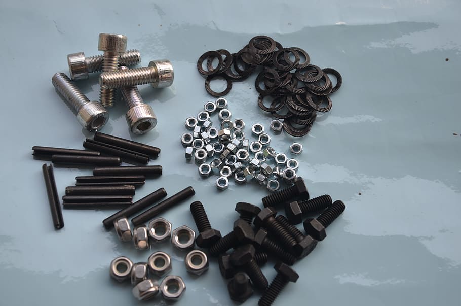 hardware, varies, large group of objects, metal, high angle view, indoors, still life, table, equipment, bolt
