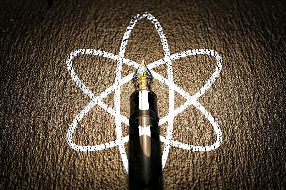atomic, atom, pen, atomic symbol, art and craft, directly above, close-up, vignette, outdoors, competition