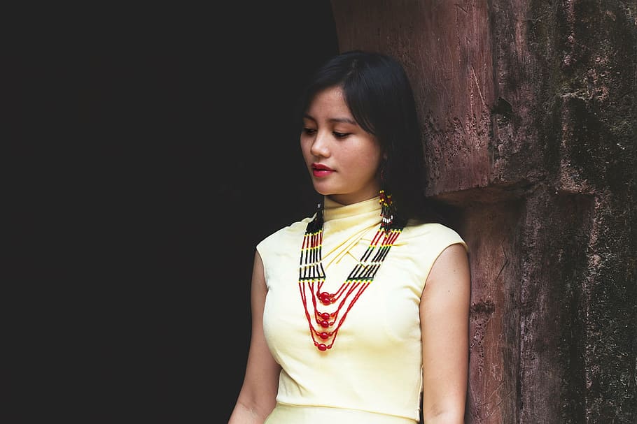 woman, lean, brown, concrete, wall, tribal dress, ethnic, tradition dress, traditional attire, tribal women