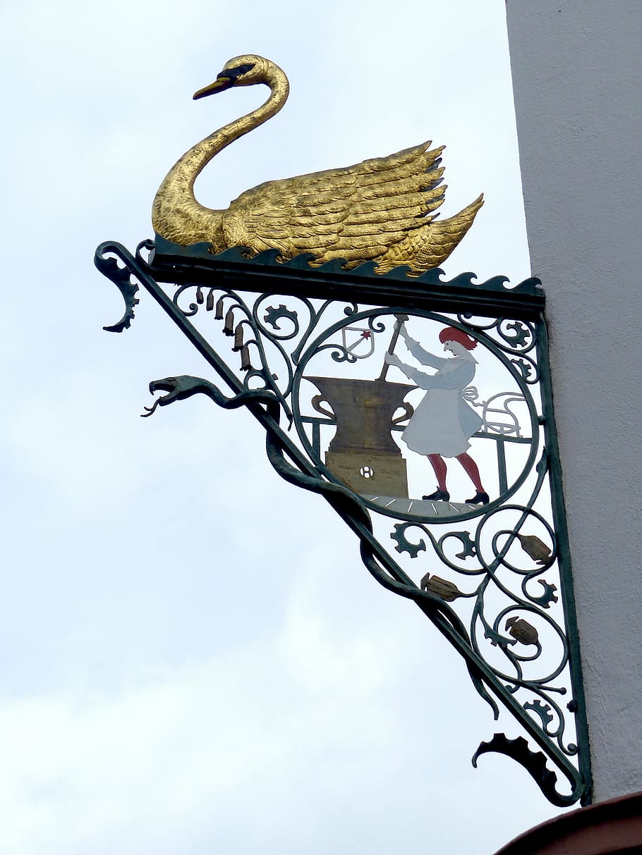 shield, swan pharmacy, colmar, blacksmithing, low angle view, sky, metal, day, art and craft, representation