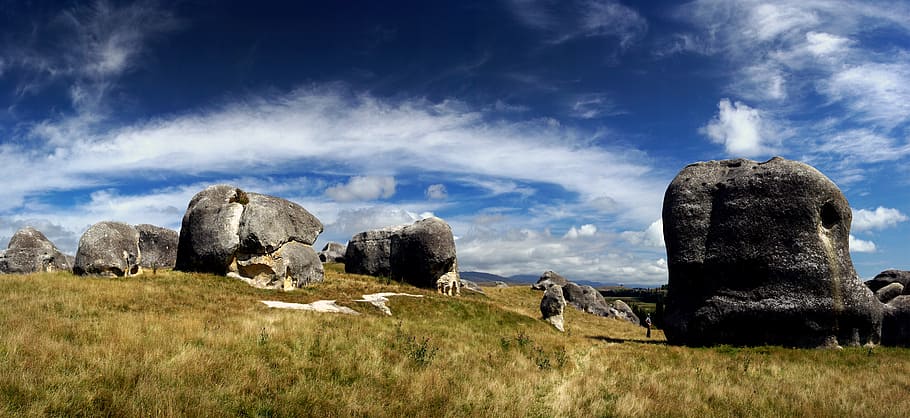 Elephant Rocks, Otago, stone formations on hill, cloud - sky, sky, history, scenics - nature, tranquil scene, grass, environment