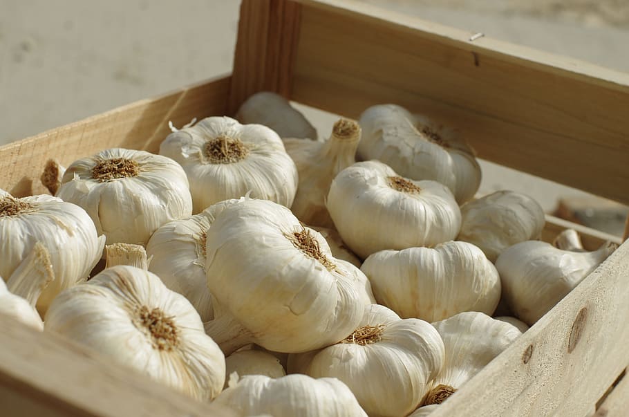 white, garlic clove lot, wooden, crate, daytime, garlic, food, vegetable, garlic grown, power