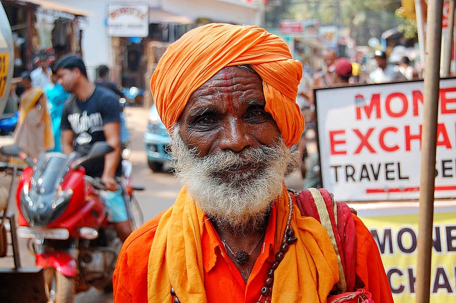 shallow, focus photography, woman, orange, collared, top, beard, the old man, turban, india