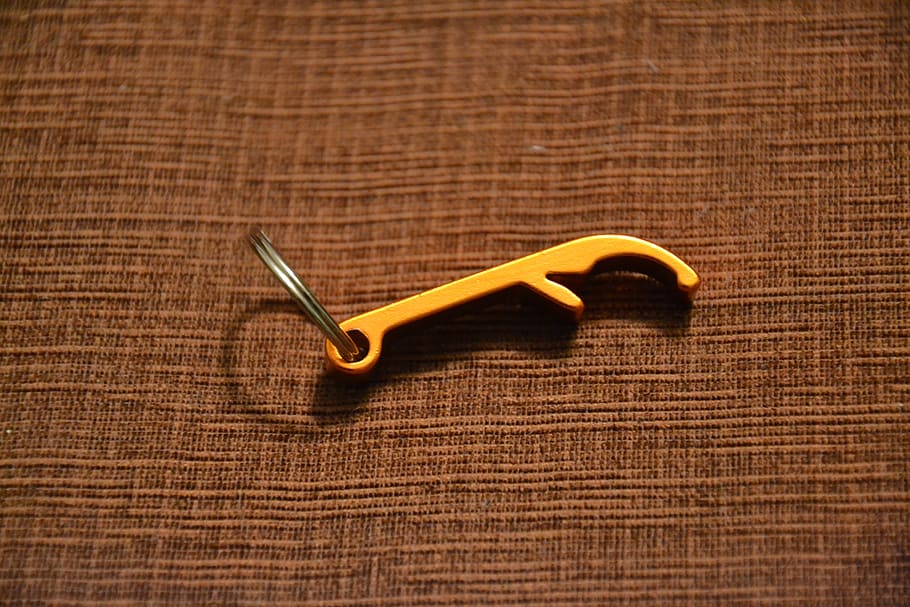 bottle opener, for beer, beer opener, brylok, key ring, keychain, key ring pendant, indoors, wood - material, table