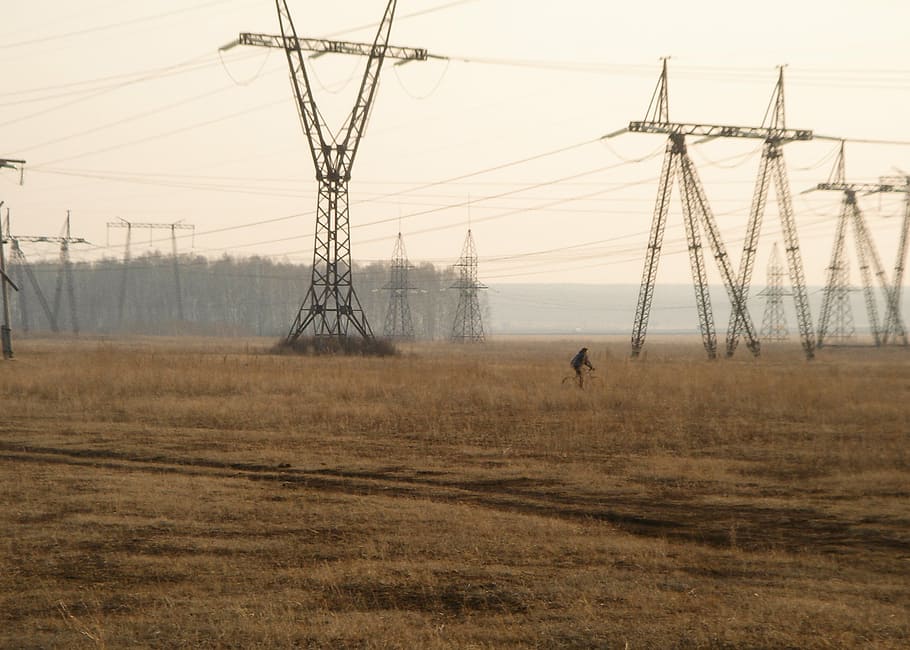black, telecommunication tower lot, transmission, towers, brown, field, line, electricity, farm, grass