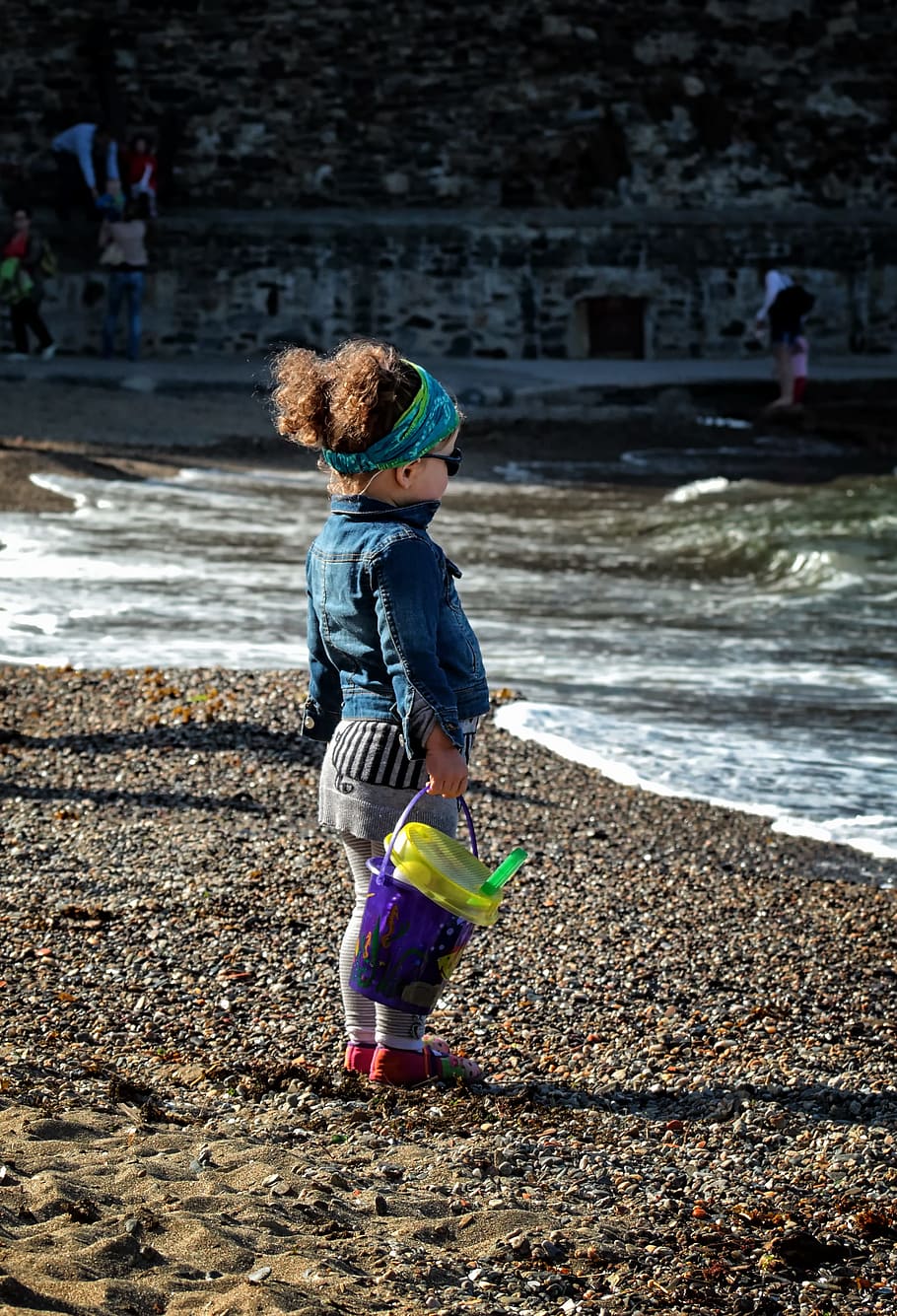 girl, holding, sand bucket, standing, beach front, child, games, beach, sea, children's games