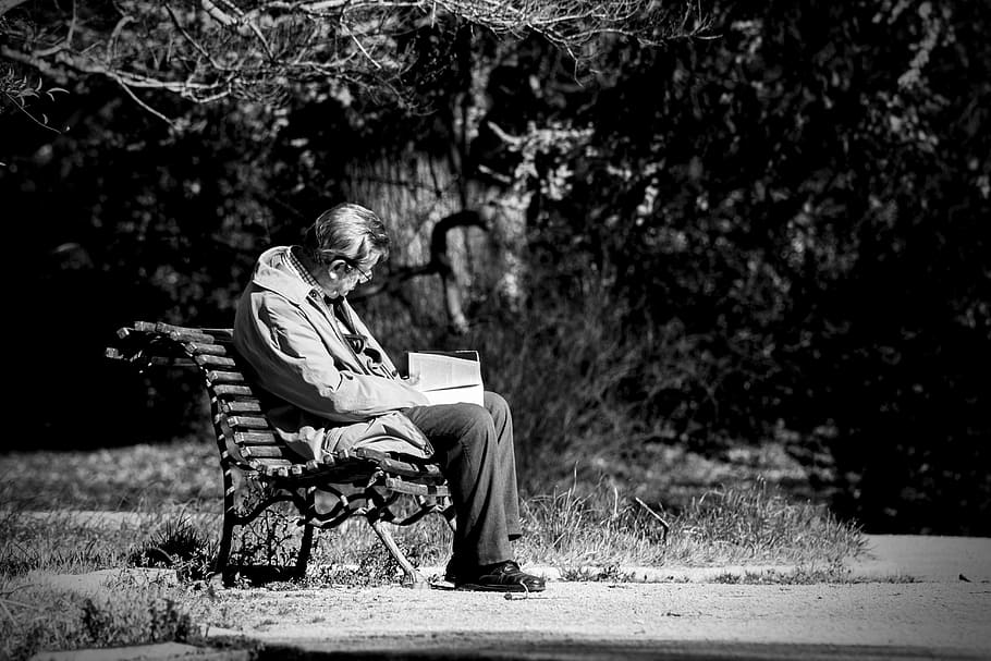 grayscale photo, man, sitting, bench, solo, reader, old, park, old sitting in the park, forest