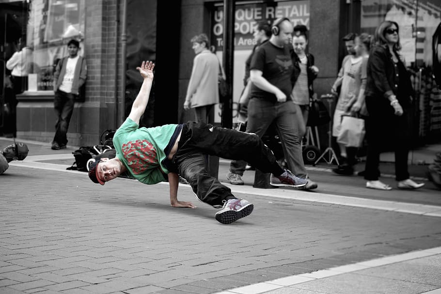 selective, color photo, man, green, red, t-shirt, b-boying, breaking, breakdancing, dance