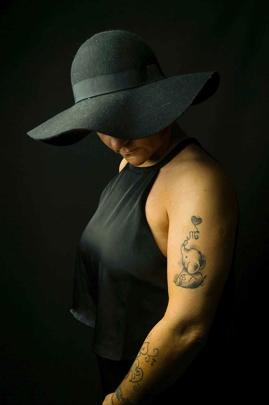 dark, melancholic, hat, black, tattooed, tattoo, human, woman, shadow, arm