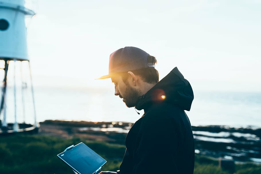 man, holding, tablet computer, sea, ocean, water, nature, blur, people, guy