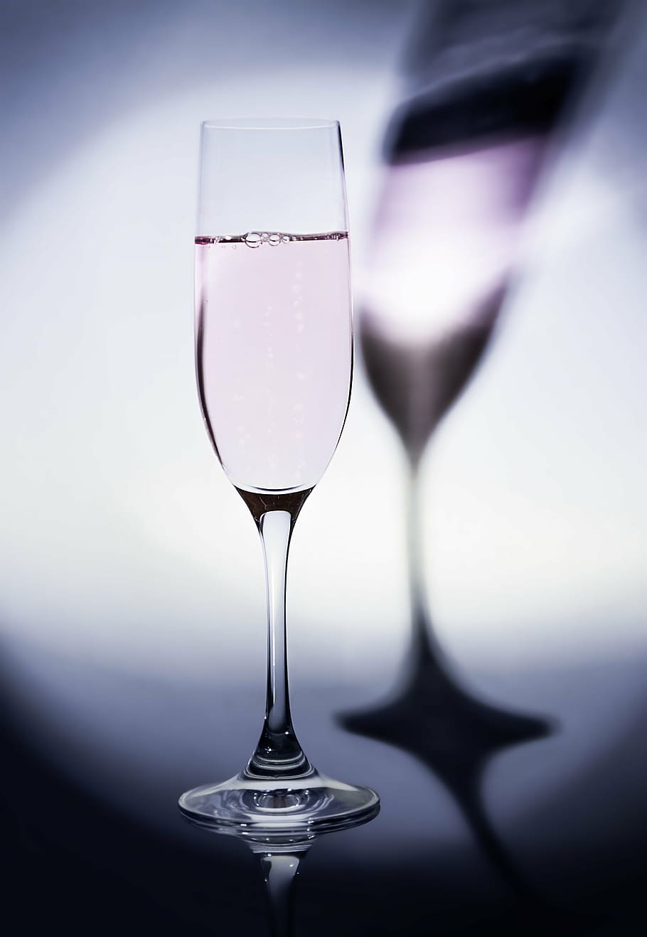 clear, long-stemmed, wine glass, filled, pink, liquid, champagne, shadow, light, glass