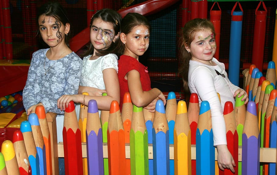 four, standing, crayon-themed fence, Girls, Kids, Anniversary, Party, Play, anniversary, party, smiling