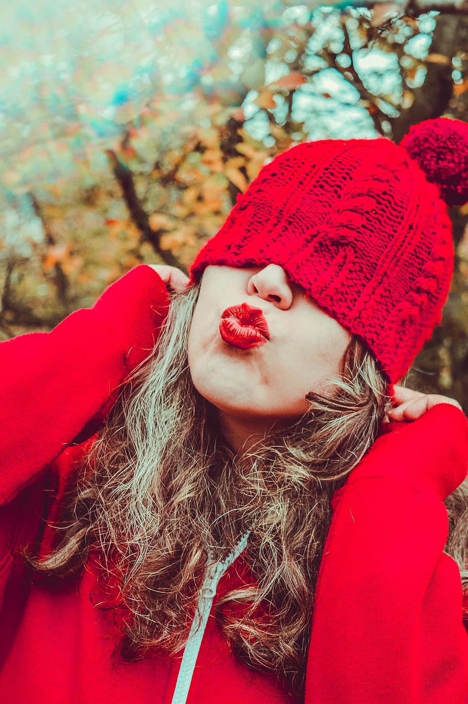 woman, red, hat, kiss, nature, outdoors, pose, funny, silly, portrait