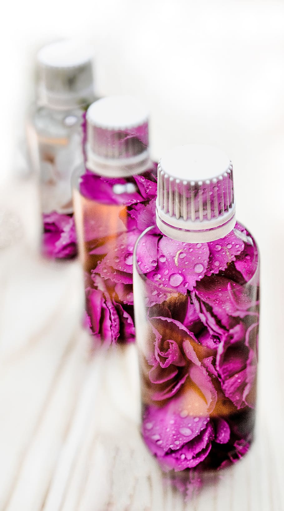 macro photography, three, pink, white, floral, plastic bottles, essential oils, oil, bottle, essential oil