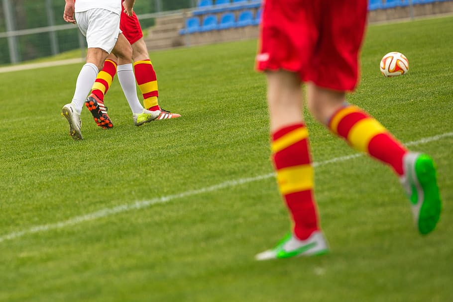 pair, red-and-yellow, soccer socks, football, duel, ball, footballers, fielder, opponents, football pitch
