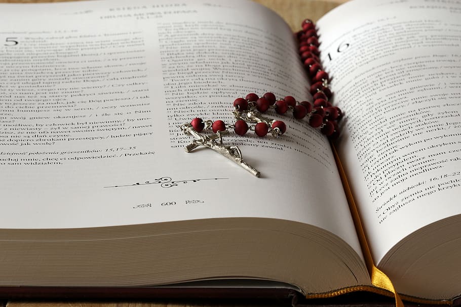silver-colored rosary, bookpage, the rosary, bible, the scriptures, cross, prayer, pray, faith, religion