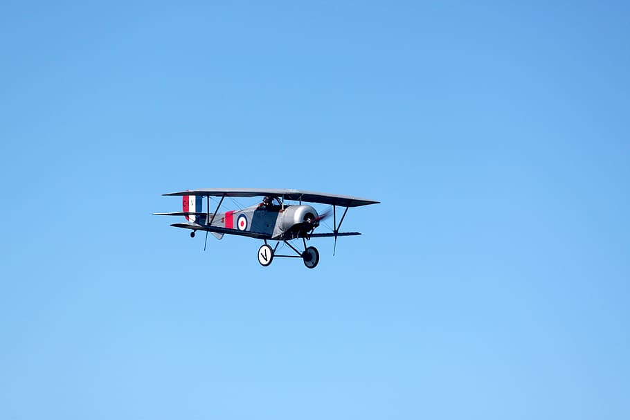 flying gray bi-plane, biplane, airplane, flight, aircraft, fly, pilot, aviation, vintage, aeroplane