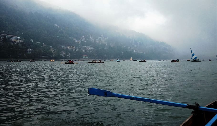nainital india, lake, stormy weather, boats, water sports, city in background, water, nautical vessel, transportation, mode of transportation