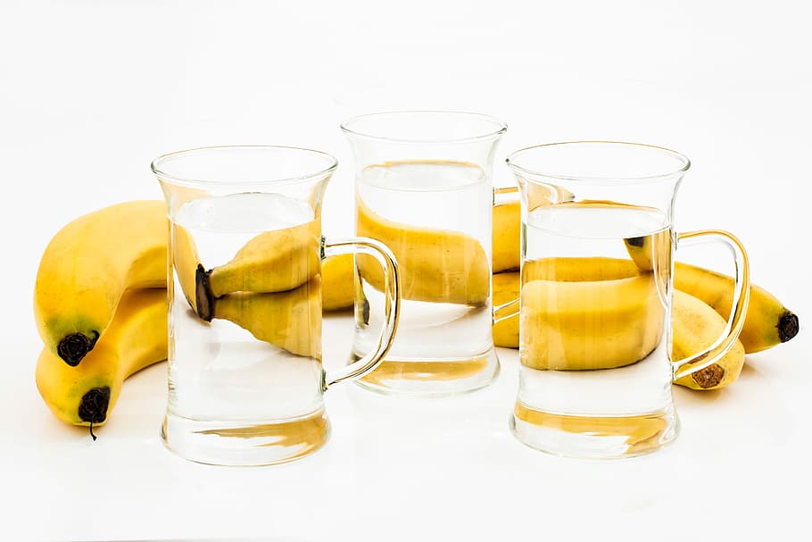 three, clear, drinking glasses, yellow, bananas, glass, drink, refreshment, banana, liquid