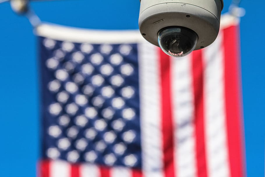 usa, flag, blur, cctv, camera, focus on foreground, low angle view, blue, day, architecture