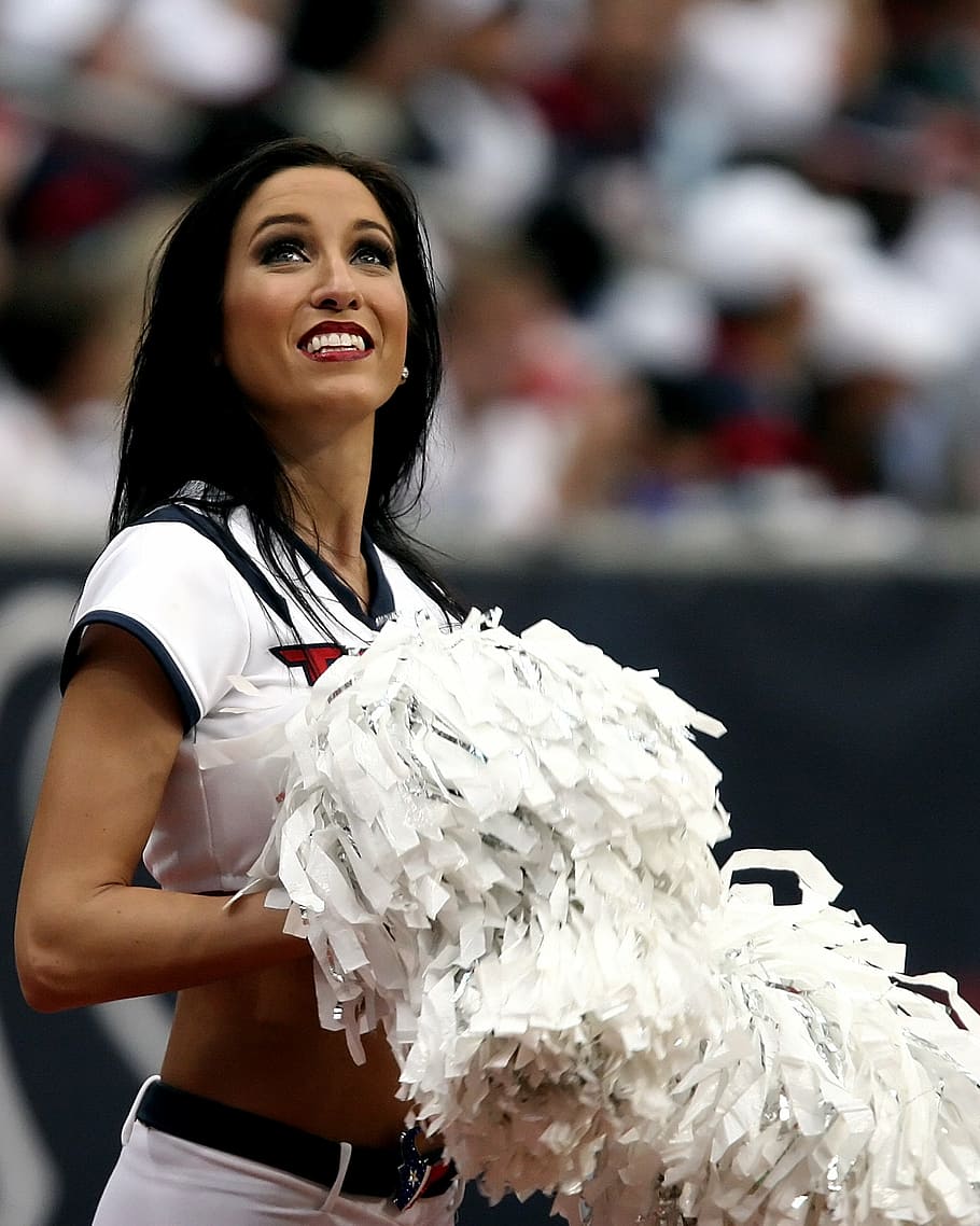 woman, wearing, white, red, cap-sleeved, top, cheerleader, professional football, game, sport