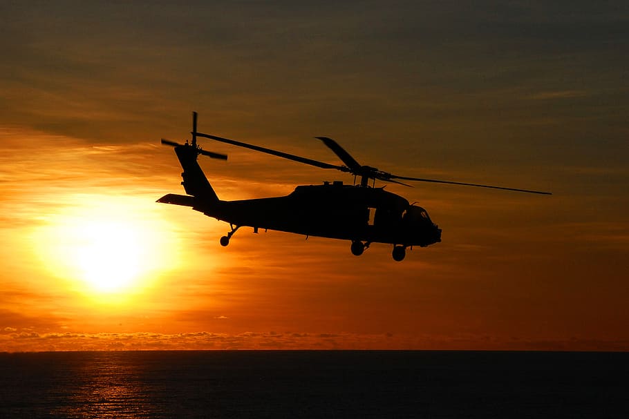 silhouette of helicopter, sea hawk helicopter, flying, sunset, silhouette, dusk, evening, military, sea, air