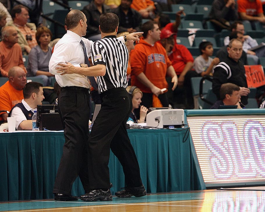 man, standing, front, referee, basketball, coach, tussle, confrontation, restraining, sport