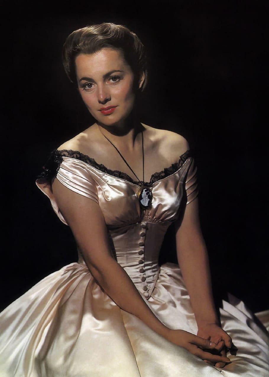 sitting, woman, wearing, white, black, off-shoulder corset gown, Olivia De Havilland, Actress, Vintage, movies