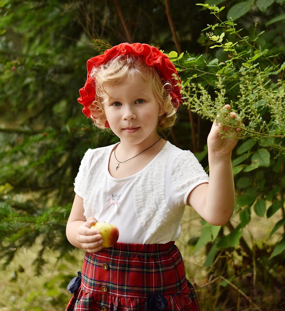 sweet daughter, little red riding hood, considerate person, apple, branch, hand, light curls, red skirt, childhood, child