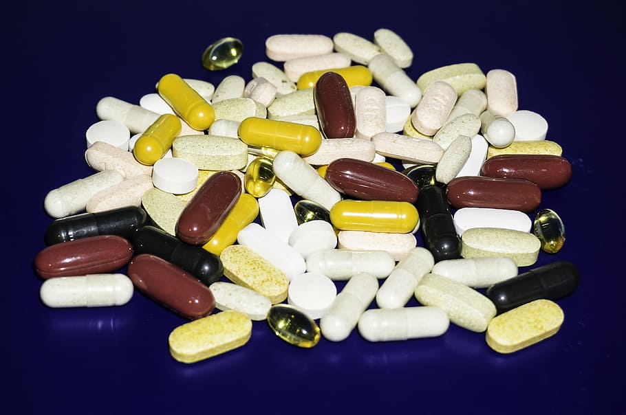 assorted-color capsules, tablets, vitamins, daily dose, supplement, capsule, tablet, remedy, health, care