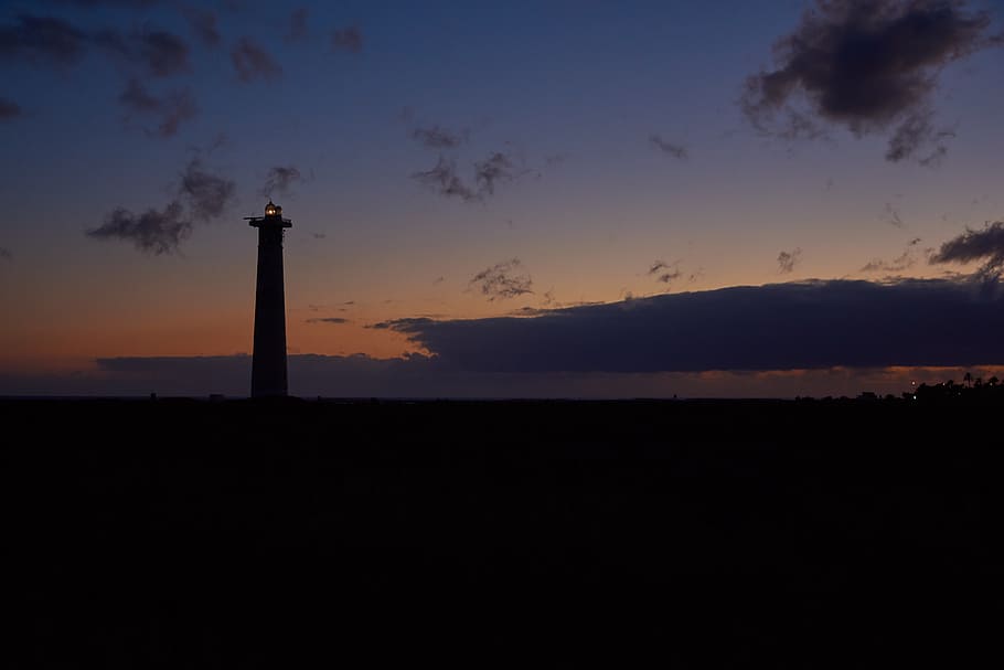 lighthouse-evening-sky-beach-sea.jpg