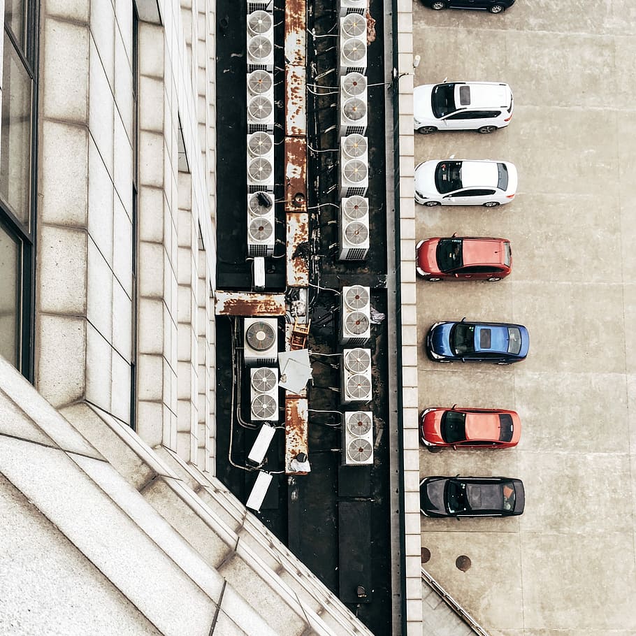 seven, cars, parked, front, white, building, top, view photography, daytime, white building