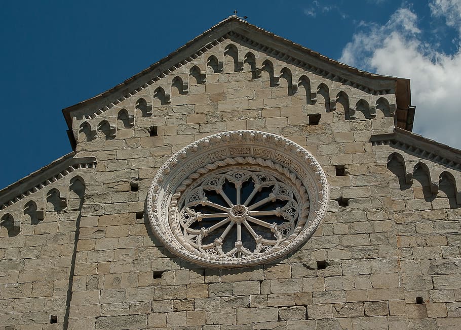 Italy, Cinque Terre, Monterosso, Church, architecture, rosette, history, religion, low angle view, building exterior