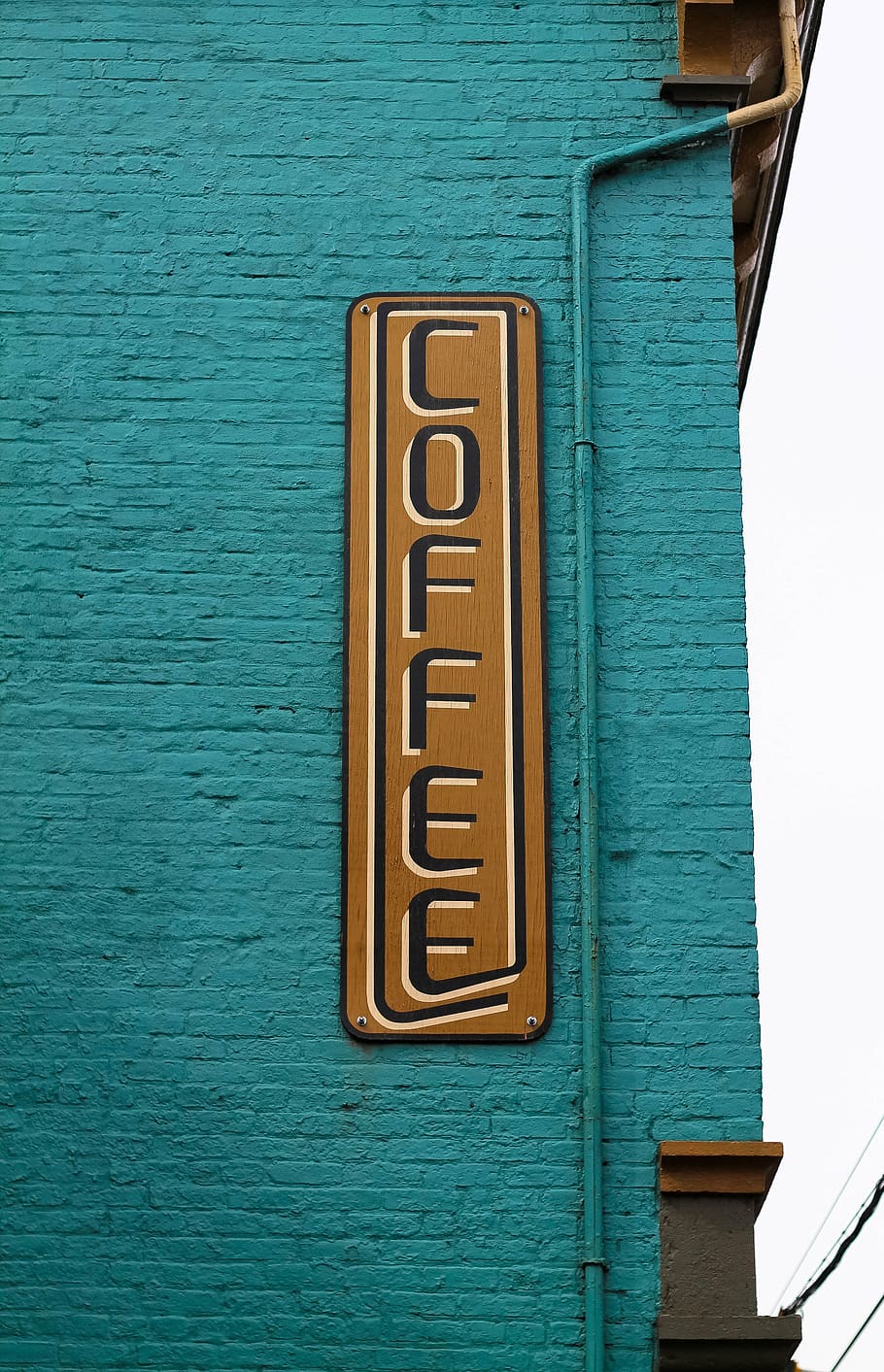 coffee signage, mounted, teal, concrete, wall, coffee, post, sign, design, art