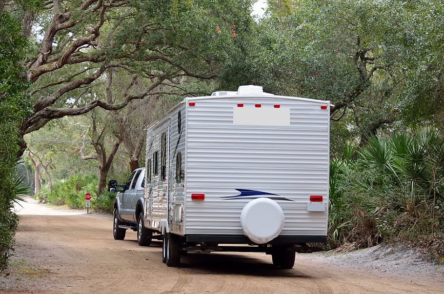 road, outdoors, travel, tree, vehicle, nature, truck, landscape, environment, camping trailer