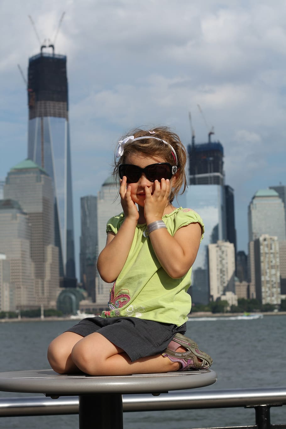 the little girl, new york, glasses, the construction of the wtc, child, a child presenting with glasses, city, sunglasses, architecture, built structure