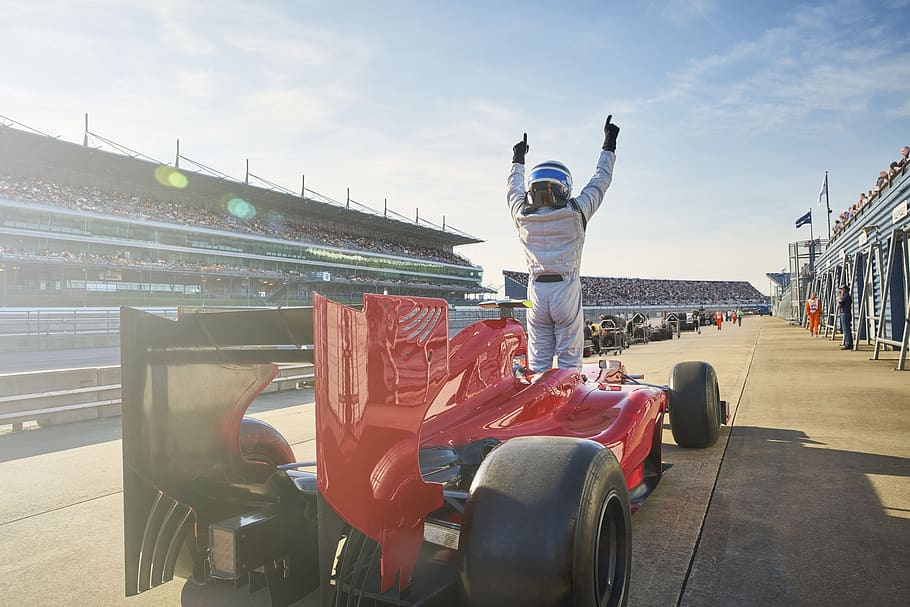 street, tourism, racing, f1, racer, sky, day, transportation, one person, arms raised