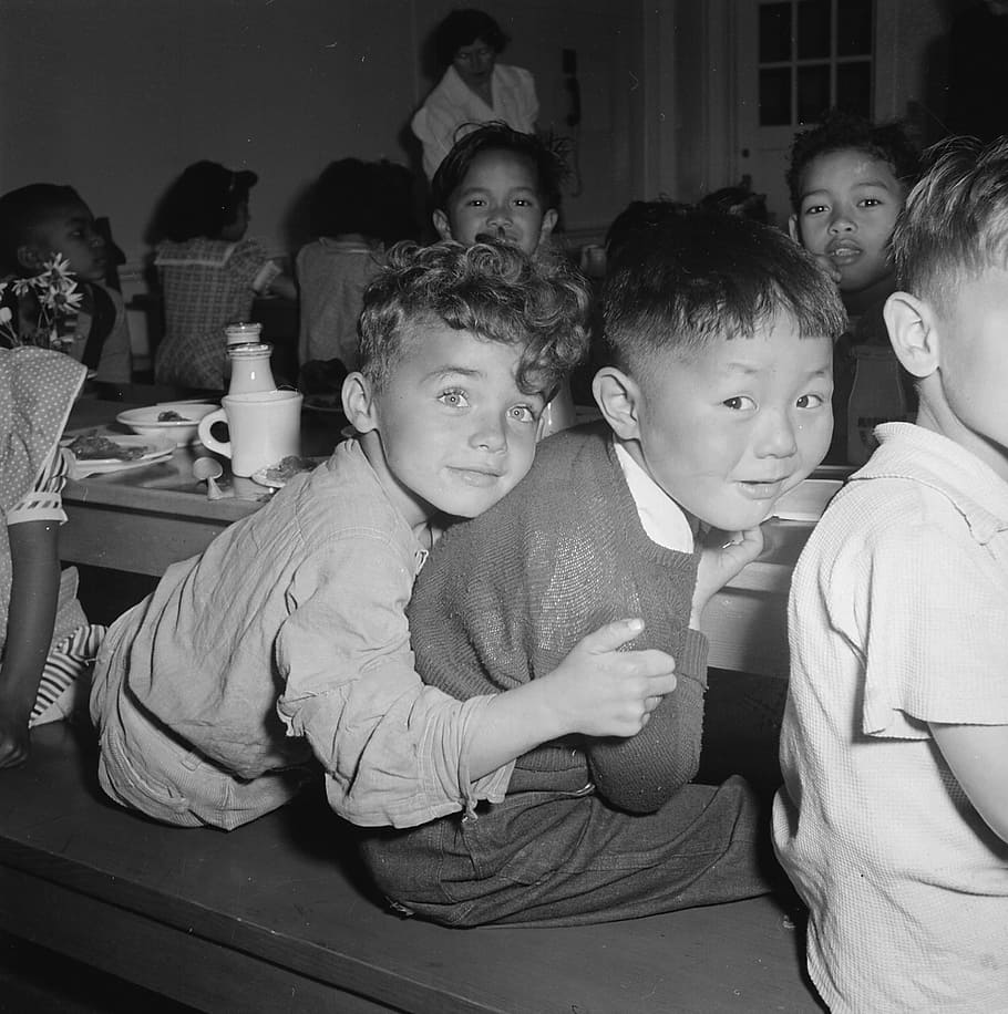 grayscale photo, children, dining, set, grayscale, 1920s, boys, girls, education, lunch