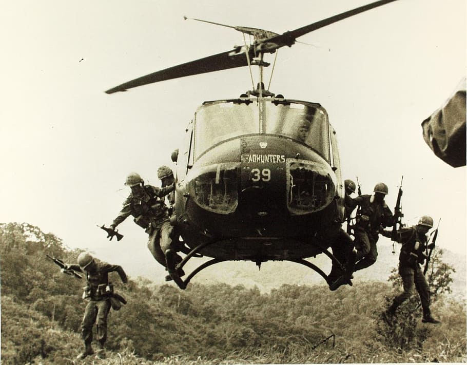 grayscale photo, soldiers, jumping, helicopter, bell uh-1, iroquois, huey, vietnam war, aircraft, transport