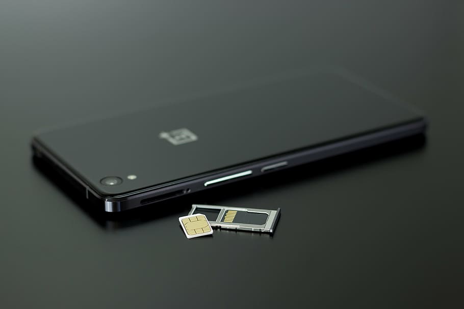 black oneplus smartphone, smartphone, technology, communication, phone, android, android phone, oneplusone smartphone, sim card, micro simcard