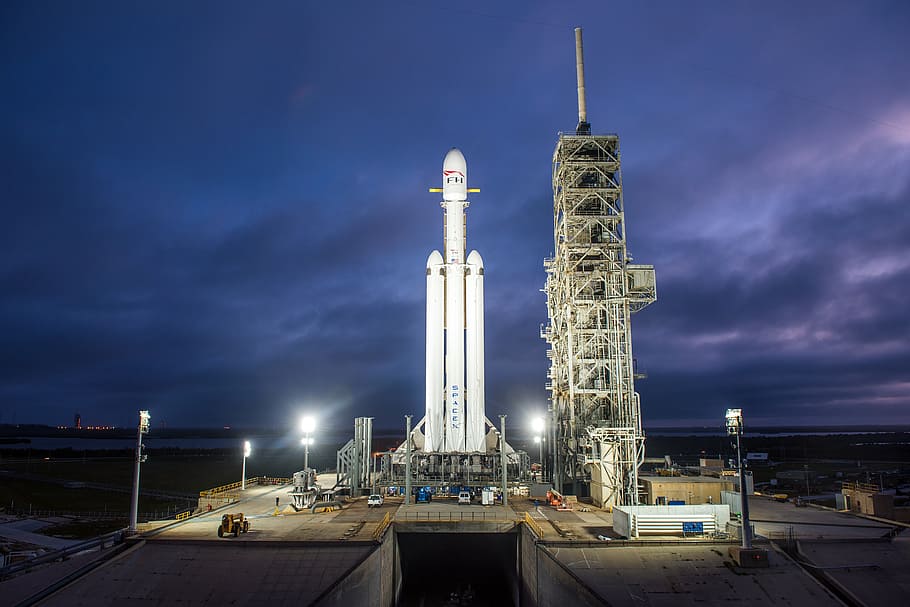 Falcon Heavy, Demo, Mission, white space shuttle, architecture, sky, built structure, building exterior, illuminated, cloud - sky