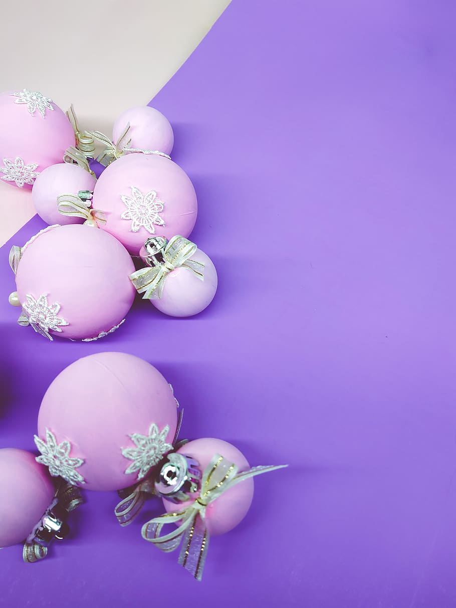flat lay, christmas spheres, pink, white and purple background, xmas and new year holiday, indoors, pink color, purple, high angle view, still life