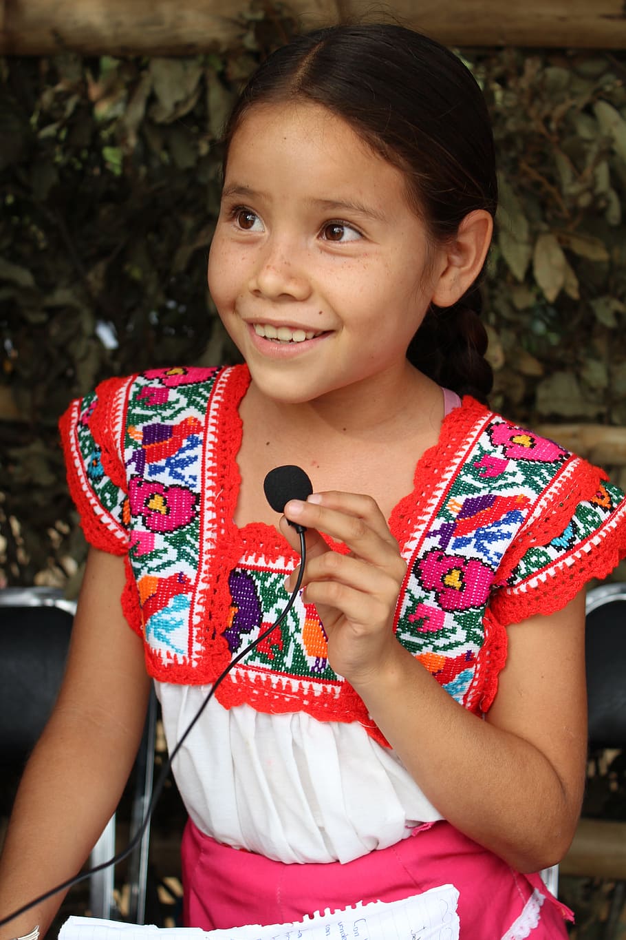 smiling, holding, microphone, Girl, Indian, Oaxaca, Mexico, chatina, poverty, face