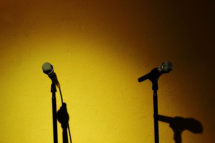 two, black, corded, microphone, stands, yellow, painted, wall, recording studio, music