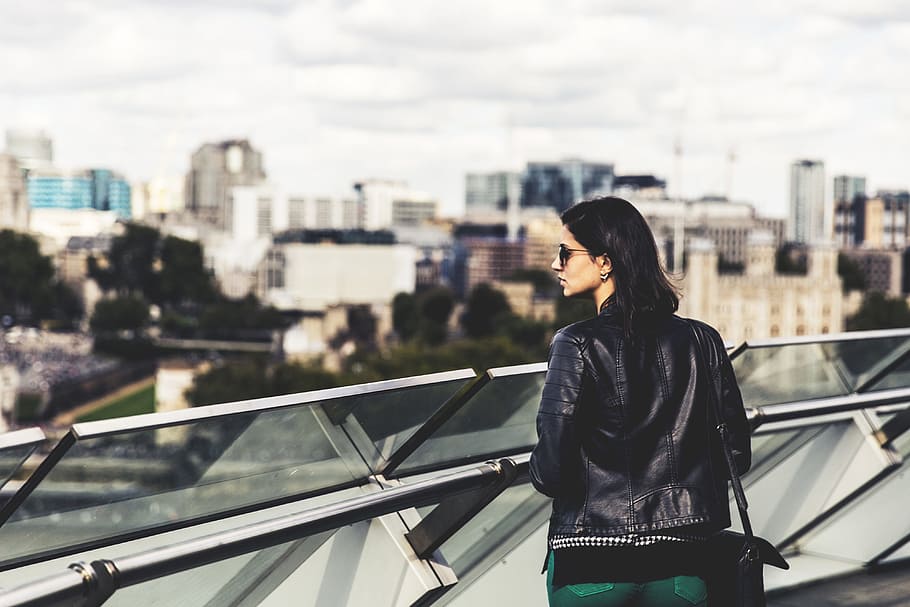 woman, wearing, leather jacket, sunglasses, looks, across, city, london., captured, canon 6