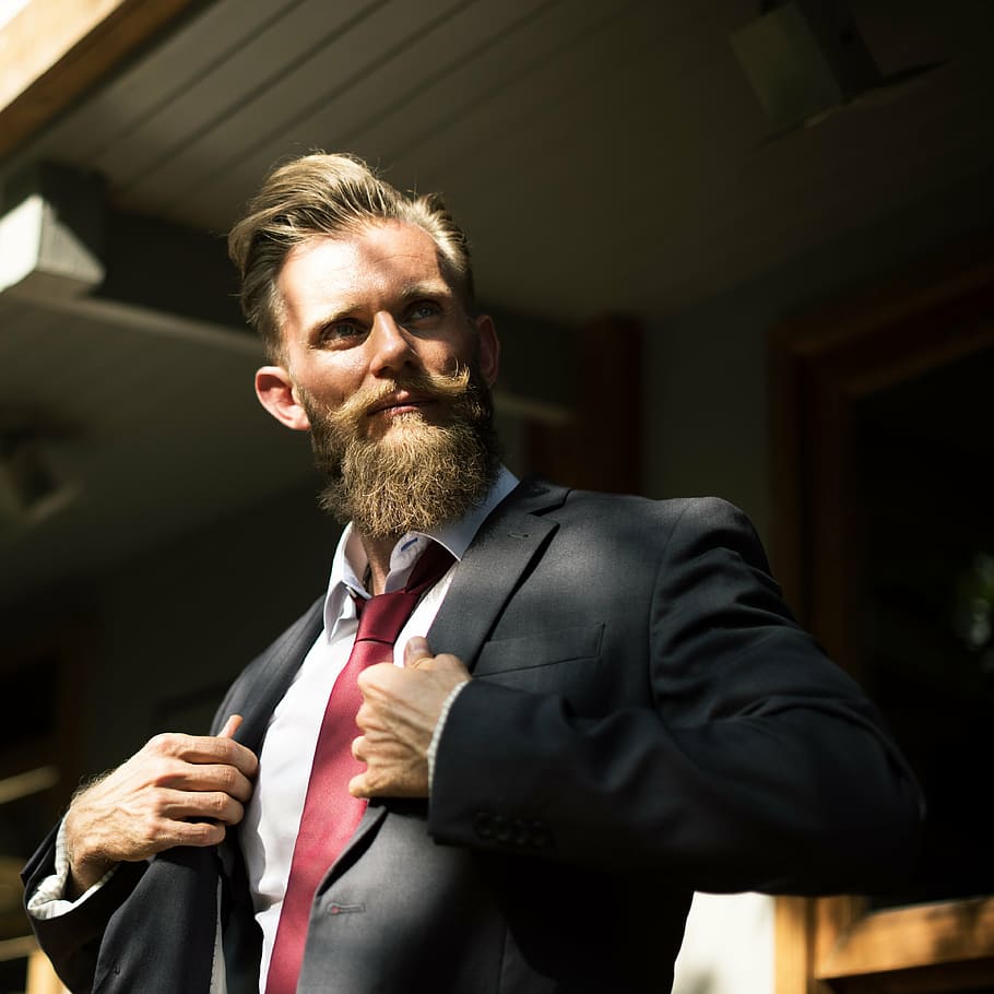 person, holding, black, suit jacket, beard, boldness, business, businessman, confidence, corporate