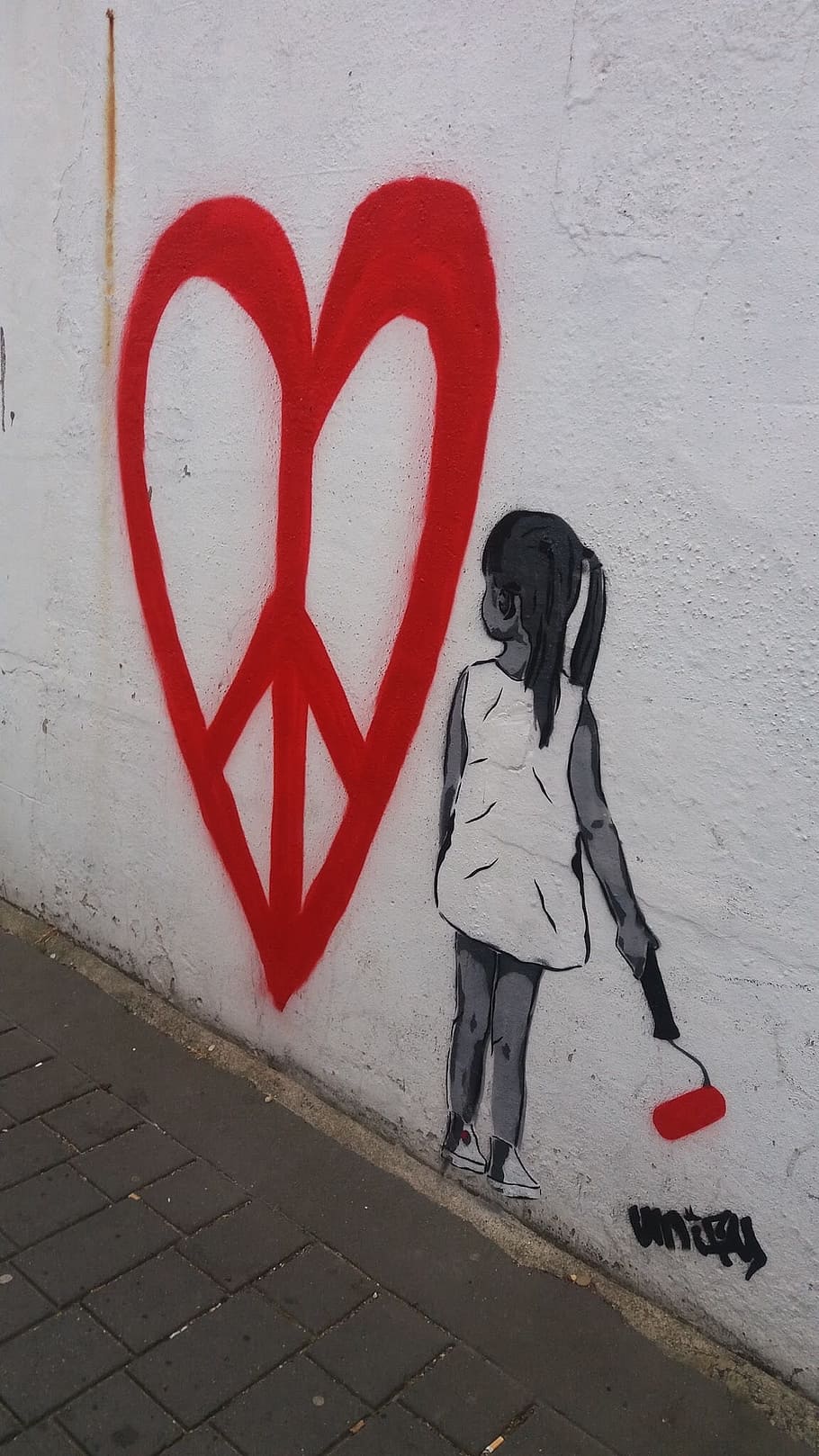 girl, holding, paint roller, looking, heart mural, wall, peace, red, little girl, white