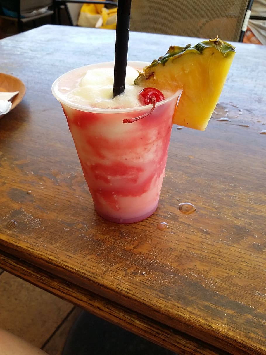 lava flow cocktail, pina colada, drink, pineapple, strawberry, daiquiri, alcohol, refreshing, straw, plastic cup
