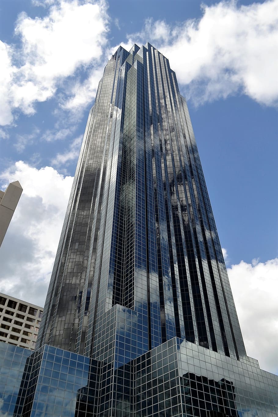 low, angle photography, glass, high-rise, building, blue, cloudy, sky, daytime, skyscraper